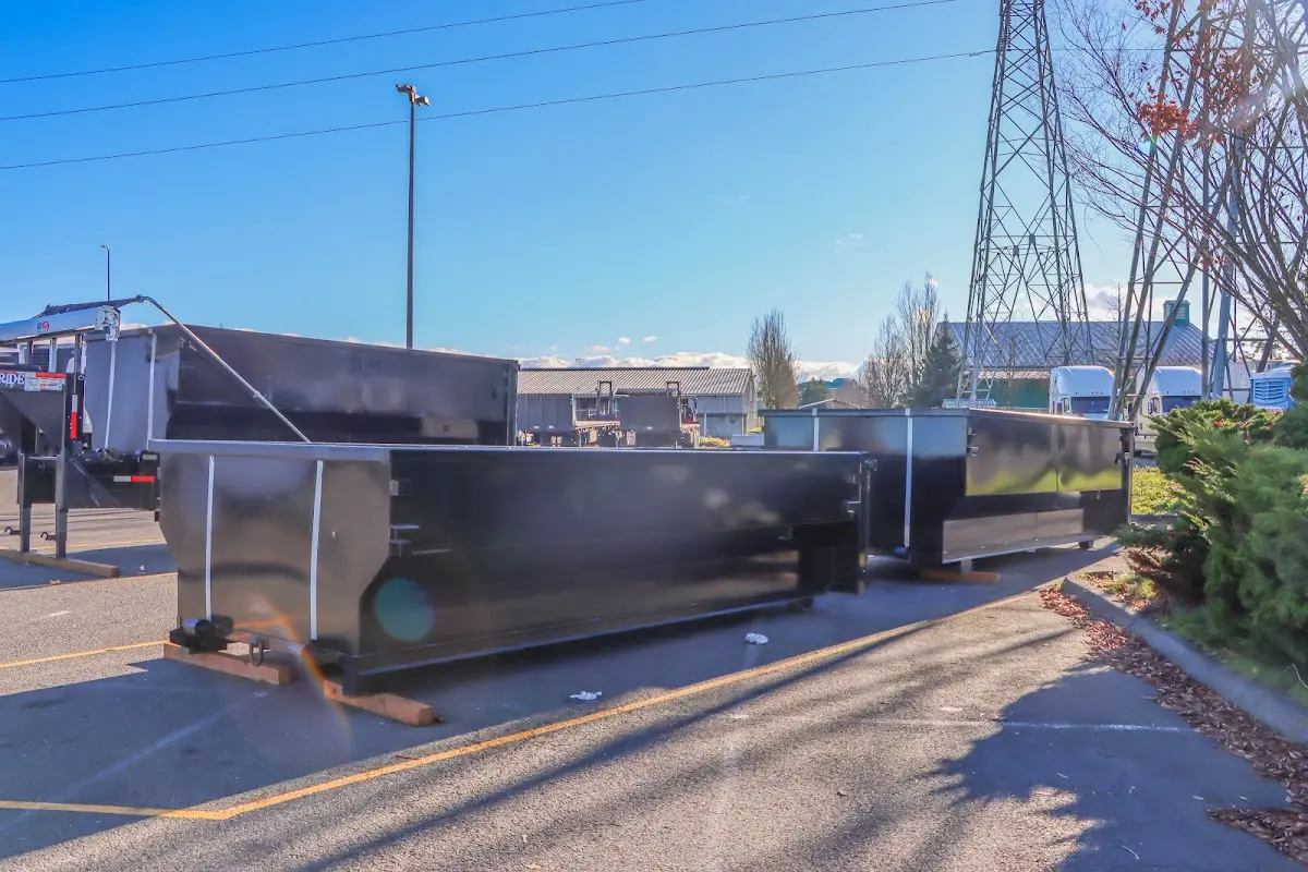 Roll-off dumpster ready for waste disposal at job site for Concrete Dumpster Rental in South El Monte